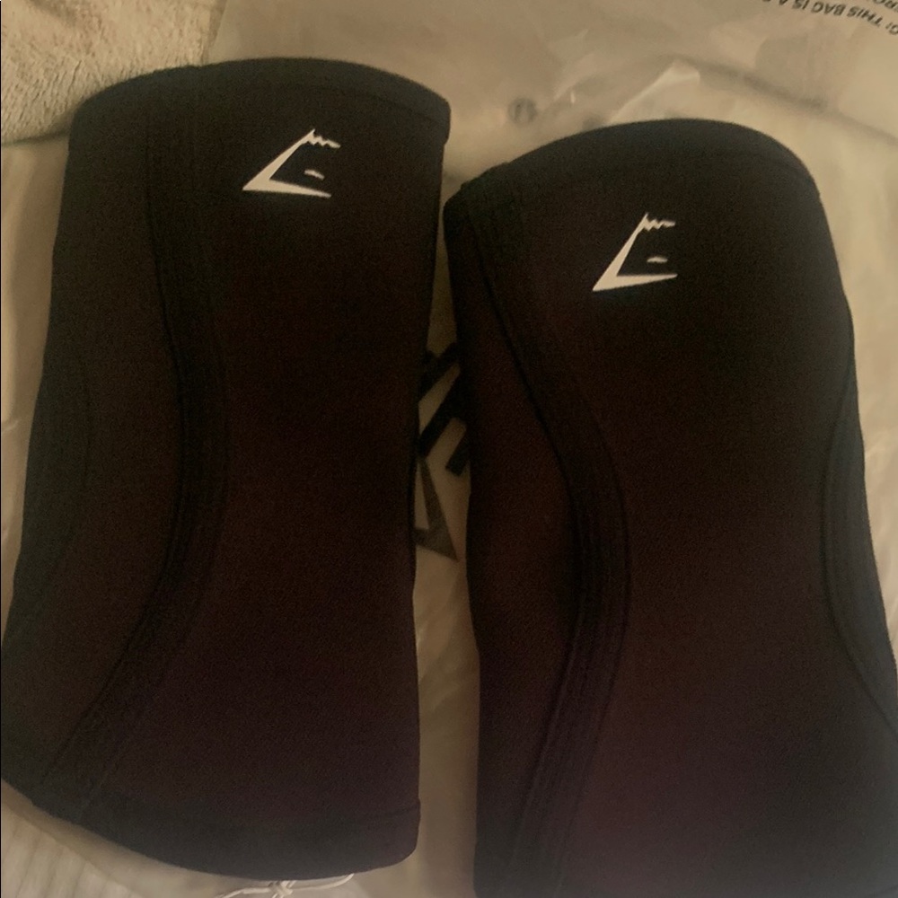 Gymshark Black knee sleeves with Durable Material and Streamlined Design